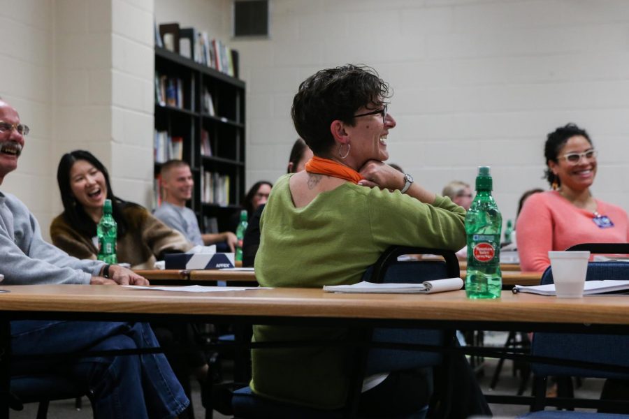 Kathrina Litchfield facilitates a discussion amongst students during a "One Community, One Book" class at Oakdale Prison on Thursday, Oct. 25, 2018. 