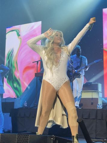 Kesha takes the stage at the US Cellular Center Friday night.