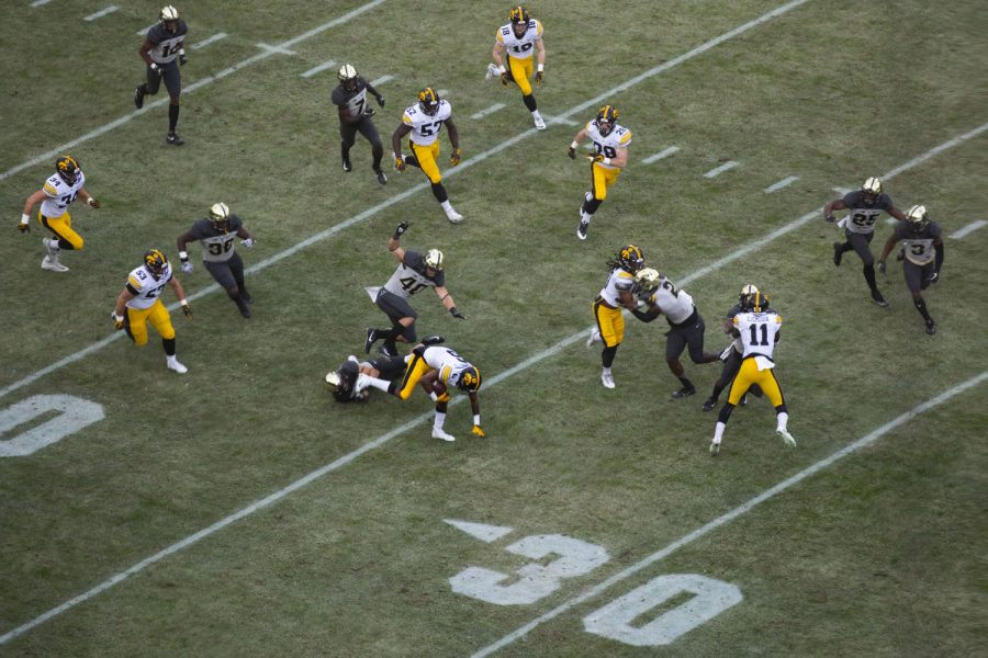 Iowa wide receiver Ihmnir Smith-Marsette (6) runs the ball during the opening drive of the third quarter during the Iowa/Purdue game at Ross-Ade Stadium in West Lafayette, Ind. The Boilermakers defeated the Hawkeyes, 38-36, with a last second field goal.