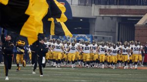 Iowa players take the field before Iowas game against Illinois at Memorial Stadium in Champaign, Illinois, on Saturday, Nov. 17, 2018. The Hawkeyes defeated the Fighting Illini 63-0.