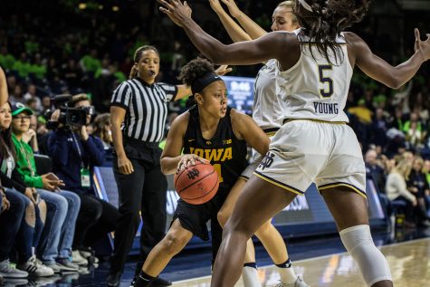 Iowa senior Tania Davis dribbles the ball during a basketball match between Iowa and Notre Dame in South Bend, IN on Thursday, November 29, 2018. The Hawkeyes were defeated by the Fighting Irish, 105-71. (Shivansh Ahuja/The Daily Iowan)