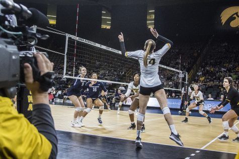 Iowa junior Cali Hoye prepares to spike the ball during a volleyball match between Iowa and Penn State at Carver-Hawkeye Arena on Saturday, Nov. 3, 2018. The Hawkeyes were shut out by the Nittany Lions, 3-0.