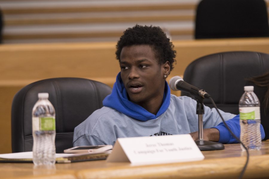 Danish Robertson  speaks during an event at the College of Law. Members of the community gathered to advocate against teenagers being held in adult prisons on Thursday, Nov. 1, 2018. 