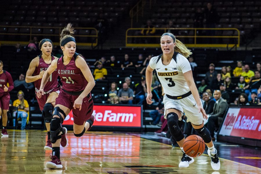 Iowa guard Makenzie Meyer dribbles past the defense during a womens basketball game between Iowa and North Carolina Central at Carver-Hawkeye Arena on Saturday, Nov. 17, 2018. The Hawkeyes devastated the visiting Eagles, 106-39. 