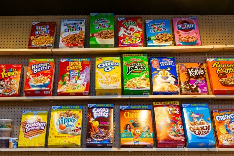 Boxes of cereal line the shelves inside of Melk, a diner and cereal bar, located in the old Food Republic space on Washington St. in Iowa City on Monday, Nov. 26, 2018. (David Harmantas/The Daily Iowan)