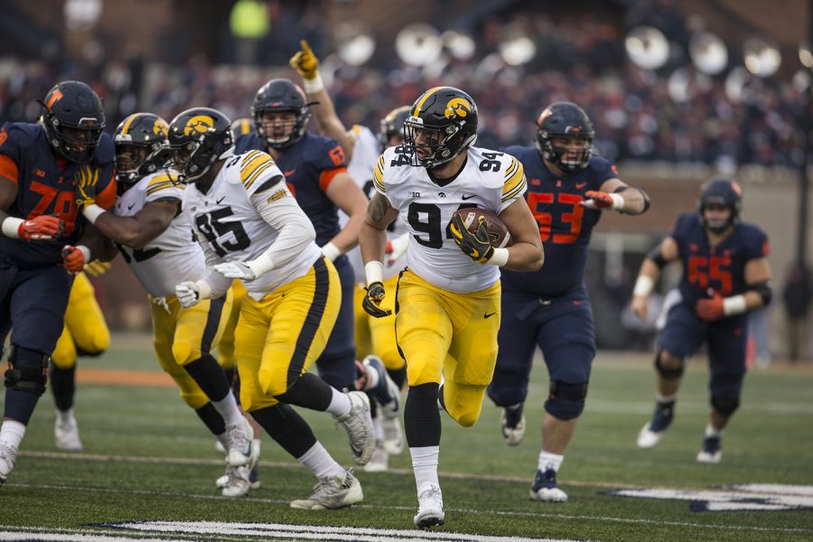 Iowa+defensive+lineman+A.J.+Epenesa+returns+a+fumble+for+a+touchdown+during+Iowas+game+against+Illinois+at+Memorial+Stadium+in+Champaign%2C+IL%2C+on+Saturday%2C+Nov.+17%2C+2018.