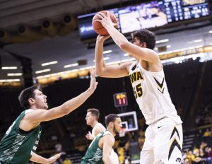 Iowa’s Luka Garza shoots a jumper at the beginning of the first half during the Iowa Vs. Green Bay basketball game. The Hawkeyes defeated the Phoenix, 93-83 at Carver-Hawkeye Arena. Iowa continues its undefeated record next week against No.14 Oregon. 