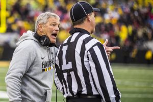 Iowa head coach Kirk Ferentz discusses the finer points of officiating with the line judge during Iowas game against Nebraska at Kinnick Stadium in Iowa City on Friday, November 23, 2018. The Hawkeyes defeated the Huskers 31-28.
