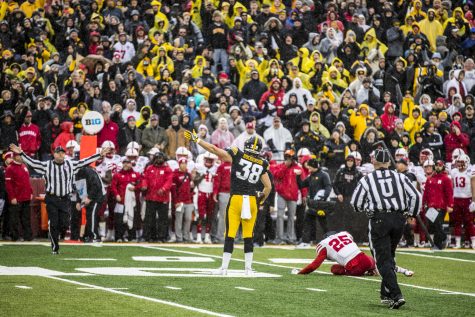 Iowa tight end T.J. Hockenson celebrates picking up a crucial first down during Iowas game against Nebraska at Kinnick Stadium in Iowa City on Friday, November 23, 2018. The Hawkeyes defeated the Huskers 31-28.