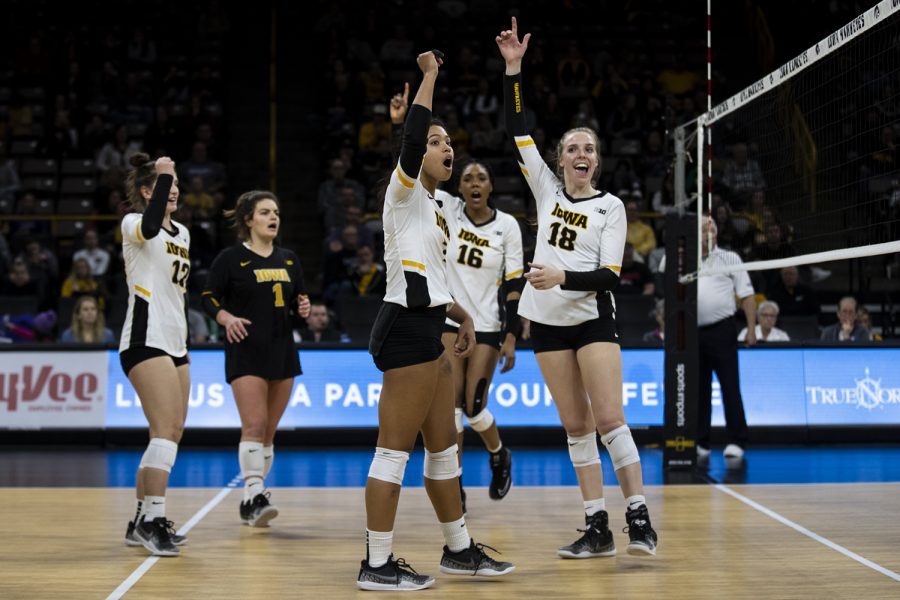 The Hawkeyes celebrate after scoring a point during a match against Ohio State at Carver-Hawkeye Arena in Iowa City on Saturday, Nov. 24, 2018. The Hawkeyes defeated the Buckeyes in five sets.