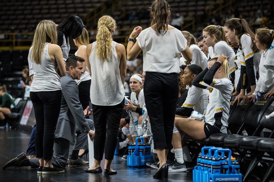 Iowa coach Bond Shymansky coaches the team on a timeout during a volleyball match between Iowa and Michigan State on Friday, Sept. 21, 2018. 