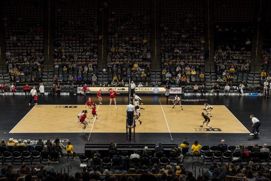 Teams rally the ball during Iowas match against Ohio State at Carver-Hawkeye Arena in Iowa City on Saturday, November 24, 2018. The Hawkeyes defeated the Buckeyes in 5 sets.