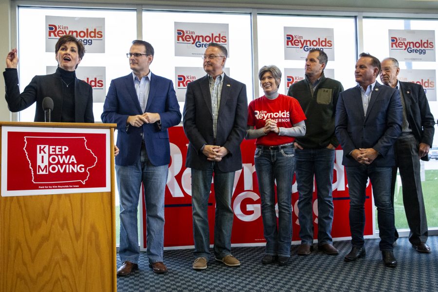 Governor Kim Reynolds speaks during a rally at the Eastern Iowa Airport in Cedar Capids on Monday, Nov. 5, 2018 as Lieutenant Governor Adam Gregg, Congressman Rod Blum, R-Iowa, Sen. Joni Ernst, R-Iowa, Iowa Secretary of Agriculture Mike Naig, Iowa Secretary of State Paul Pate, and Senator Chuck Grasley, R-Iowa, look on. The event was part of Reynolds’ flying tour of Iowa on the day before the midterm elections. (Nick Rohlman/The Daily Iowan)