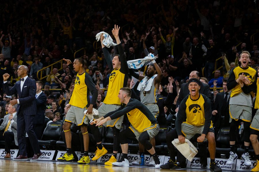 Iowa players react during Iowa's game against Iowa State at Carver-Hawkeye Arena on December 6, 2018. The Hawkeyes defeated the Cyclones 98-84.(Megan Nagorzanski/The Daily Iowan)