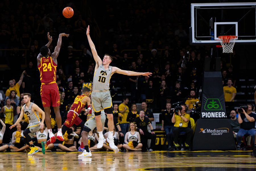 Iowa forward Joe Wieskamp attempts to block a shot during Iowa's game against Iowa State at Carver-Hawkeye Arena on December 6, 2018. The Hawkeyes defeated the Cyclones 98-84.(Megan Nagorzanski/The Daily Iowan)