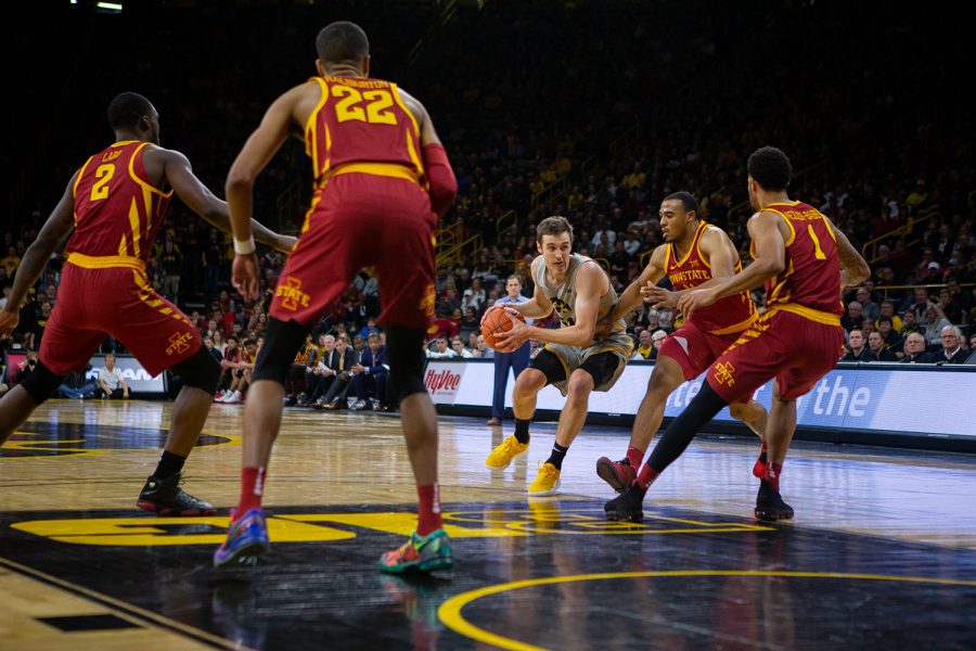 Iowa forward Nicholas Baer drives the lane during Iowa's game against Iowa State at Carver-Hawkeye Arena on December 6, 2018. The Hawkeyes defeated the Cyclones 98-84.(Megan Nagorzanski/The Daily Iowan)