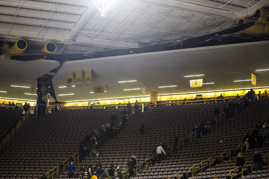 Fans leave the game after the mens basketball game against Western Carolina at Carver-Hawkeye Arena on Tuesday, December 18, 2018. The Hawkeyes defeated the Catamounts 78-60. 