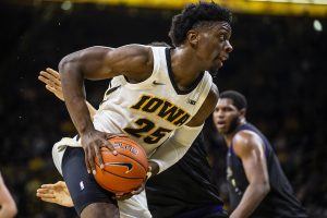Iowa forward Tyler Cook (25) dribbles the ball during the mens basketball game against Western Carolina at Carver-Hawkeye Arena on Tuesday, December 18, 2018. The Hawkeyes defeated the Catamounts 78-60.