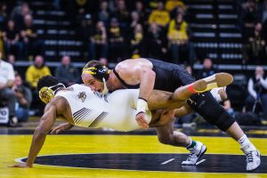 Iowas Alex Marinelli wrestles Lehighs Cole Walter during a wrestling dual-meet between Iowa and Lehigh at Carver-Hawkeye Arena on Saturday, Dec. 8, 2018. Marinelli, who is ranked fourth at 165, defeated Walter 20-5, and the Hawkeyes defeated the Mountain Hawks, 28-14.