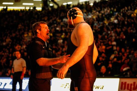 Iowas Sam Stoll informs Head Coach Tom Brands that he will be wrestling against Iowa States Gannon Gremmel during Iowas dual meet against Iowa State at Carver-Hawkeye Arena in Iowa City on Saturday, December 1, 2018. Stoll defeated Gremmel 5-1. Iowa defeated the Cyclones 19-18. 
