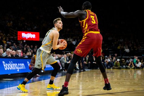 Iowa guard Jordan Bohannon looks to pass during Iowas game against Iowa State at Carver-Hawkeye Arena on Dec. 6, 2018. The Hawkeyes defeated the Cyclones 98-84.