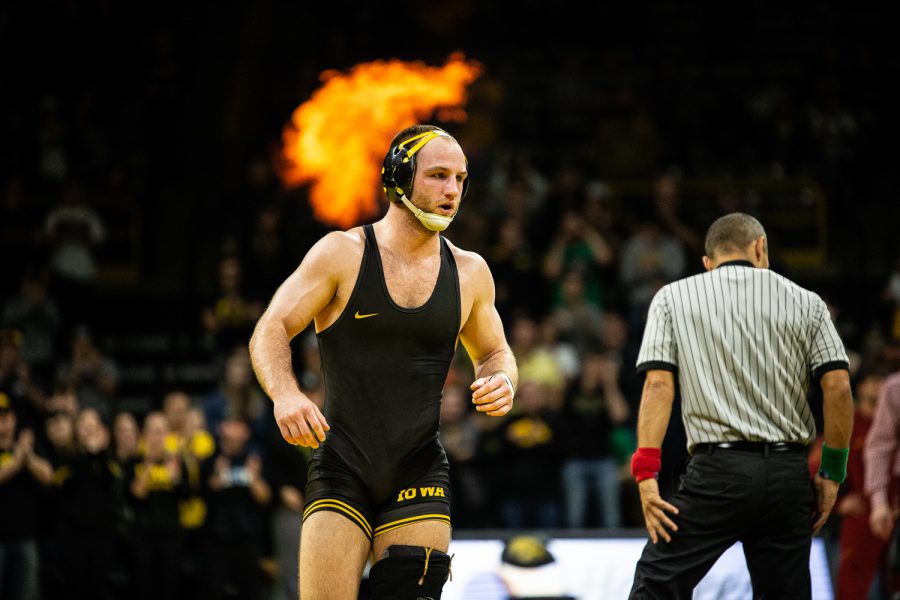 Alex Marinelli exits the mat after pinning Iowa States Brady Jennings during Iowas dual meet against Iowa State at Carver-Hawkeye Arena in Iowa City on Saturday, December 1, 2018. Iowa defeated the Cyclones 19-18. (Wyatt Dlouhy/The Daily Iowan)