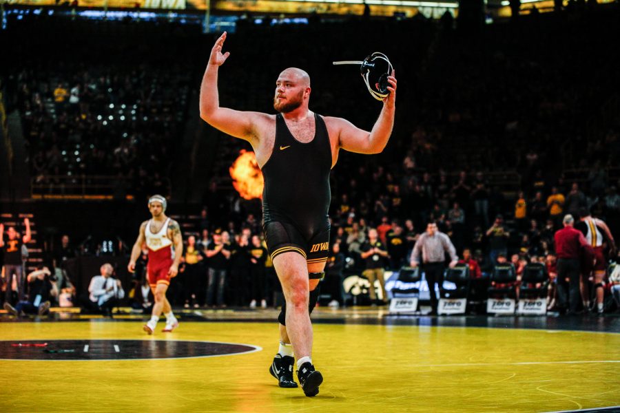 Sam+Stoll+walks+off+the+mat+defeating+Iowa+States+Gannon+Gremmel+5-1+during+Iowas+dual+meet+against+Iowa+State+in+Carver-Hawkeye+Arena+in+Iowa+City+on+Saturday%2C+December+1%2C+2018.+The+Hawkeyes+defeated+the+Cyclones+19-18.+%28Wyatt+Dlouhy%2FThe+Daily+Iowan%29