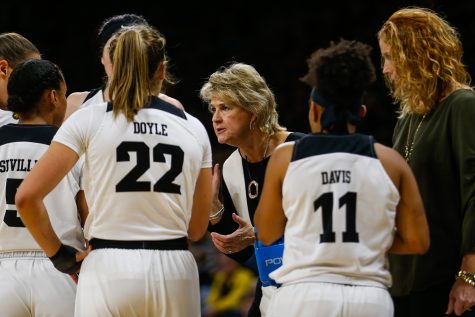 Iowa head coach Lisa Bluder talks to Iowa players during a time-out at the womens basketball game against IUPUI at Carver-Hawkeye Arena on Saturday, December 8, 2018. The Hawkeyes defeated the Jaguars 72-58. 