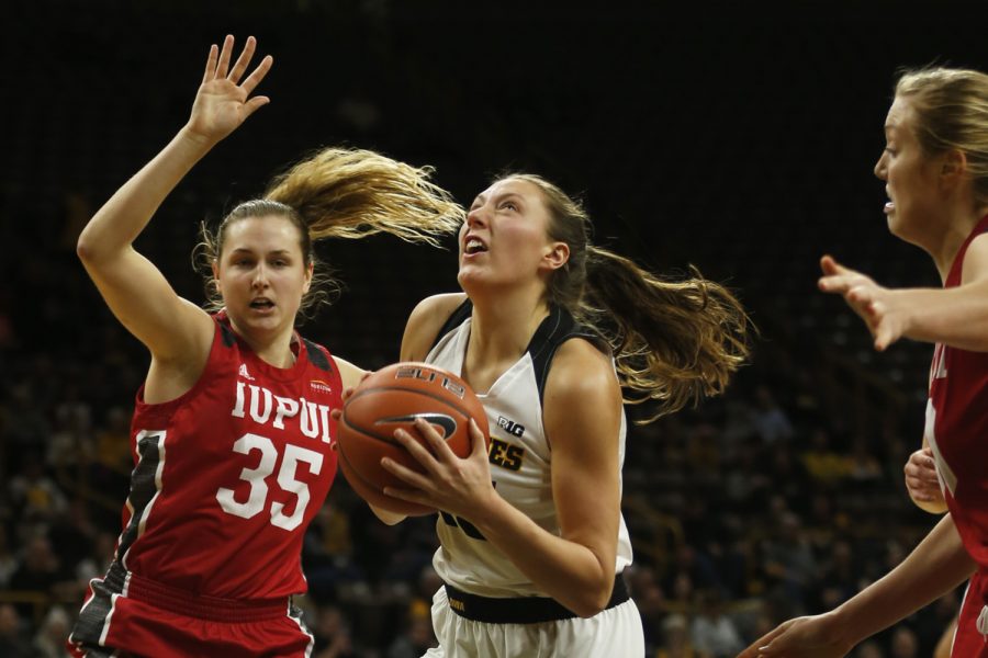 Iowa forward Amanda Ollinger prepares to shoot a basket against IUPUI at Carver-Hawkeye Arena on Saturday, December 8, 2018. The Hawkeyes defeated the Jaguars 72-58. (Katina Zentz/The Daily Iowan)