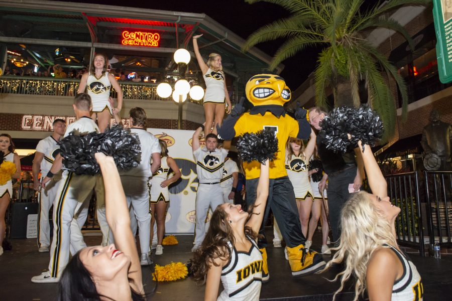 The Iowa spirit squad and Herky perform during the Outback Bowl New Years Eve Parade in Ybor City, Florida on Monday, December 31, 2018.