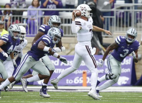 Kansas State defenders try to contain Mississippi State quarterback Nick Fitzgerald (7) in the first half on Saturday, Sept. 8, 2018, at Snyder Family Stadium in Manhattan, Kan. Mississippi State won, 31-10. (Bo Rader/Wichita Eagle/TNS)