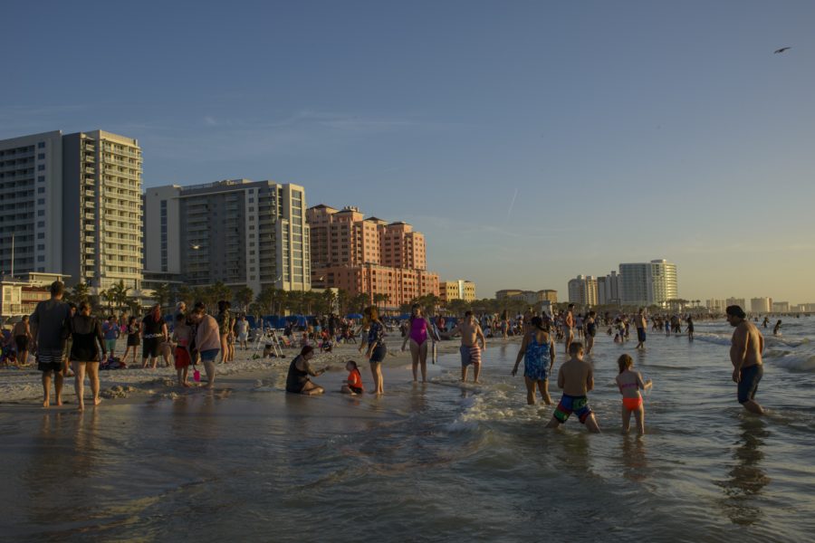 Beachgoers enjoy the water during Outback Bowl Beach Day at the Hilton Clearwater Beach Resort in Clearwater, Florida on Sunday, December 30, 2018. The day’s festivities included a variety of events for fans and general merrymaking.