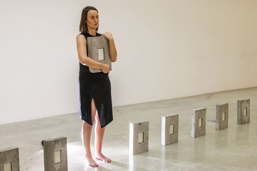 UI intermedia graduate student, Melissa Airy, holds a stone that is part of her series, "Dear Pilgrim, Thank You," in the Visual Arts Building on Friday, November 16, 2018. Airy dedicates her artwork to show how the Camino de Santiago, a 500-mile pilgrimage across Spain, impacted her life personally and as an artist. 