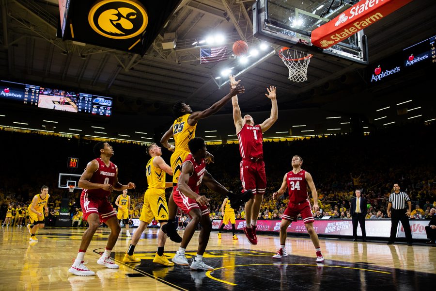 Iowa+forward+Tyler+Cook+jumps+for+the+rebound+during+Iowas+game+against+Wisconsin+at+Carver-Hawkeye+Arena+on+November+30%2C+2018.+The+Hawkeyes+were+defeated+by+the+Badgers+72-66.