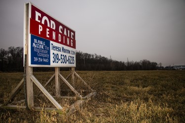 A for sale sign is seen at the intersections of North Gilbert St. and Southgate Avenue on Thursday, December 13, 2018. The new Iowa City Diversion Center will be built on this property and will allow for those with mental illnesses to receive emergency care. 