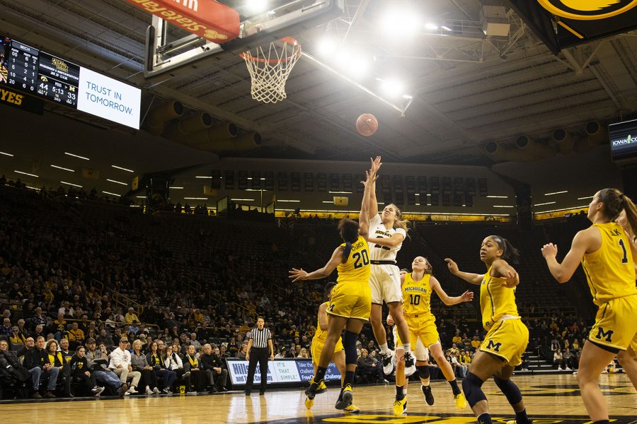 Iowa guard Kathleen Doyle attempts a shot during the Iowa/Michigan womens basketball game at Carver-Hawkeye Arena on Thursday, January 17, 2019. The Hawkeyes defeated the Wolverines, 75-61. 