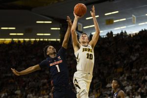 Iowa guard Joe Wieskamp attempts a shot during the Iowa/Illinois mens basketball game at Carver-Hawkeye Arena on Sunday, January 20, 2019. The Hawkeyes defeated the Fighting Illini, 95-71. 