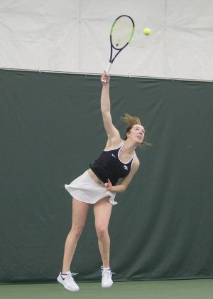 Iowas Samantha Mannix serves the ball during a womens tennis match between Iowa and Northern Texas on Sunday, January 20, 2019. The Hawkeyes defeated the Mean Green, 5-2.