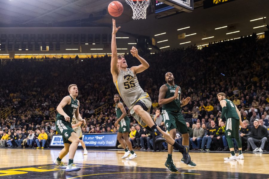 Iowa+forward+Luka+Garza+%2355+throws+up+a+shot+during+a+basketball+game+against+Michigan+State+on+Thursday%2C+Jan.+24%2C+2019.+The+Spartans+defeated+the+Hawkeyes+82-67.+%28David+Harmantas%2FThe+Daily+Iowan%29