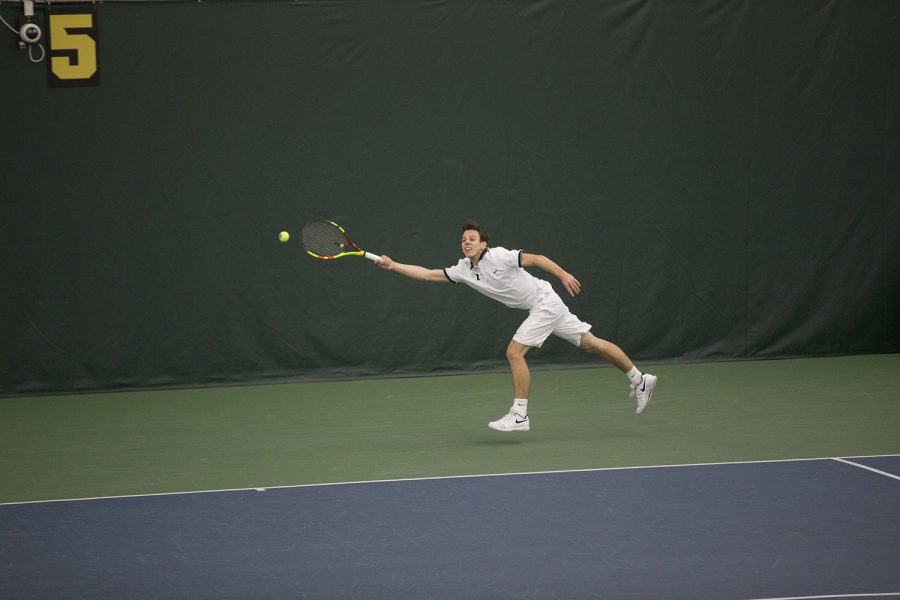 Piotr Smietana competes during the Iowa vs North Dakota Mens Tennis match at the HTRC on Friday, January 25, 2019. The Hawkeyes defeated the Fighting Hawks, 7-0.