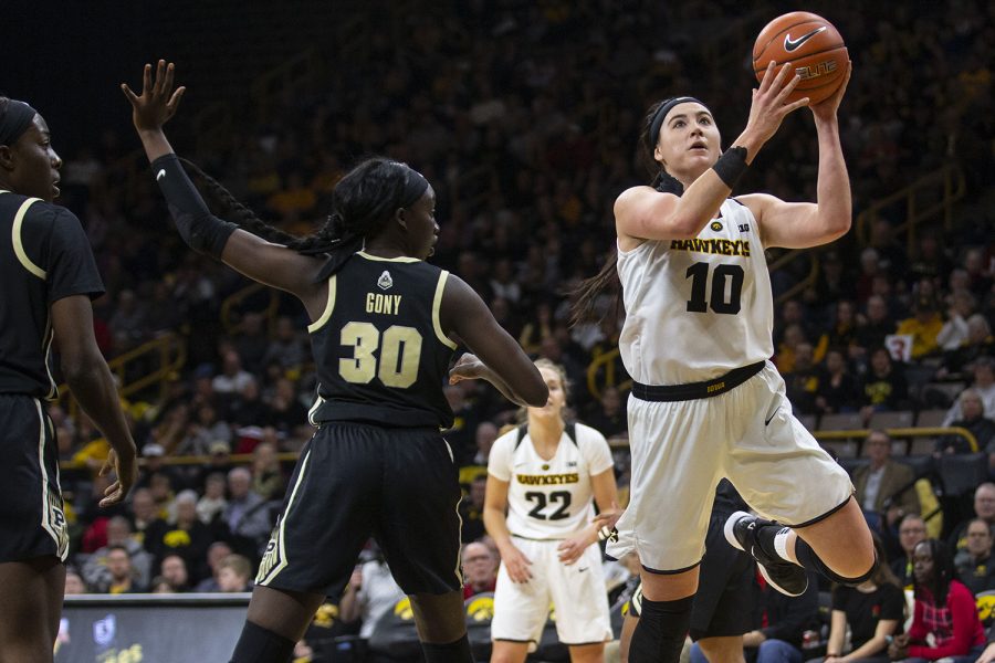 Iowa center Megan Gustafson attempts a layup during the Iowa/Purdue women's basketball game at Carver-Hawkeye Arena on Sunday, January 27, 2019. The Hawkeyes defeated the Boilermakers, 72-58. (Lily Smith/The Daily Iowan)
