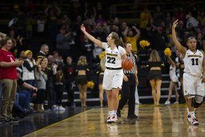 Iowa guard Kathleen Doyle gestures at the crowd to get loud during the Iowa/Purdue womens basketball game at Carver-Hawkeye Arena on Sunday, January 27, 2019. The Hawkeyes defeated the Boilermakers, 72-58. (Lily Smith/The Daily Iowan)