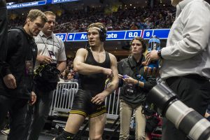Iowas 125-pound Spencer Lee walks off the mat after defeating Purdues Luke Welch during Session 2 of the NCAAs Wrestling Championships at Quicken Loans Arena in Cleveland, OH on Thursday, March 15, 2018. 