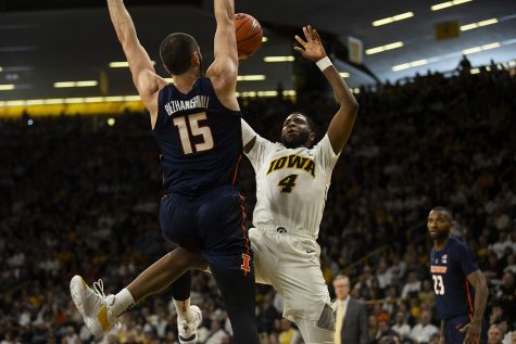 Iowa guard Isaiah Moss attempts a layup during the Iowa/Illinois mens basketball game at Carver-Hawkeye Arena on Sunday, January 20, 2019. The Hawkeyes defeated the Fighting Illini, 95-71. 