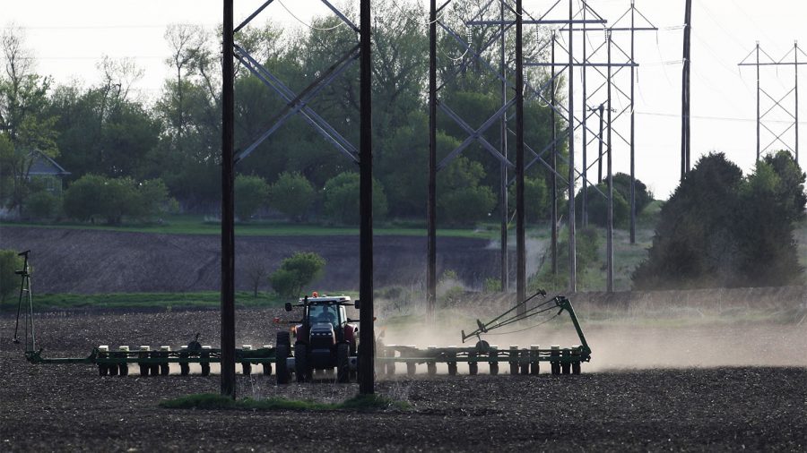 Crop farmer Bob Worth plants soybeans on the family farm Thursday, May 17, 2018, in Lake Benton, Minn. 