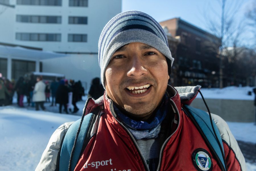 Alex Choquemamani poses for a portrait after the Women's March in Iowa City on Saturday, January 19, 2019. Choquemamani left Peru due to family reasons before arriving in the United States three months ago. During an English speaking group meeting at the Iowa City Public Library, his professor invited him to attend the march. "Human rights for women is a fight because they face problems with economic issues and violence. This march helps them and is a fight for everyone, not just women.