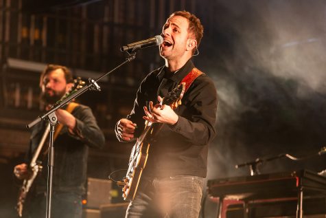 Lead vocalist and guitarist Taylor Goldsmith of Dawes sings during An Evening with Dawes at the Englert Theater in Iowa City on Sunday, Jan. 27, 2019. Dawes is an American folk-rock band hailing from Los Angeles.