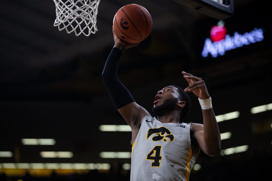 Iowa guard Isiah Moss lays the ball up during Iowas game against Nebraska at Carver-Hawkeye Arena on Sunday, January 6, 2019. The Hawkeyes defeated the Cornhuskers 93-84.