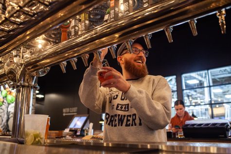 Zach Suiter pours a beer at Big Grove Brewery in Iowa City on Monday, January 28, 2019. Tailwind, a collaborative brew between Ragbrai and Big Grove, will be available in May. 