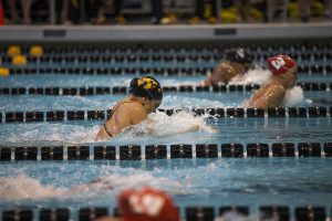 Iowa swimmer Devin Jacobs competes during the Northwestern/Wisconsin swim meet at the Campus Recreation and Wellness Center on Saturday, January 19, 2019. The men’s swimming and diving team defeated the Badgers, 164-136, and the Wildcats, 194-106. The women’s swimming and diving team fell to the Badgers, 191-109, and the Wildcats, 178-122. 